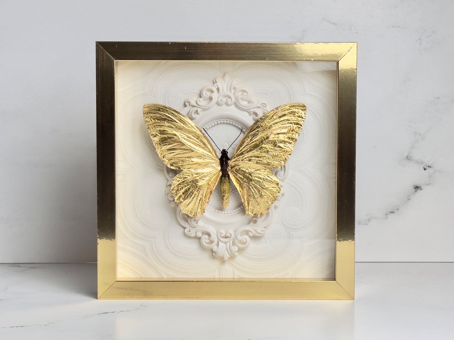 Gold leafed bird wing butterfly